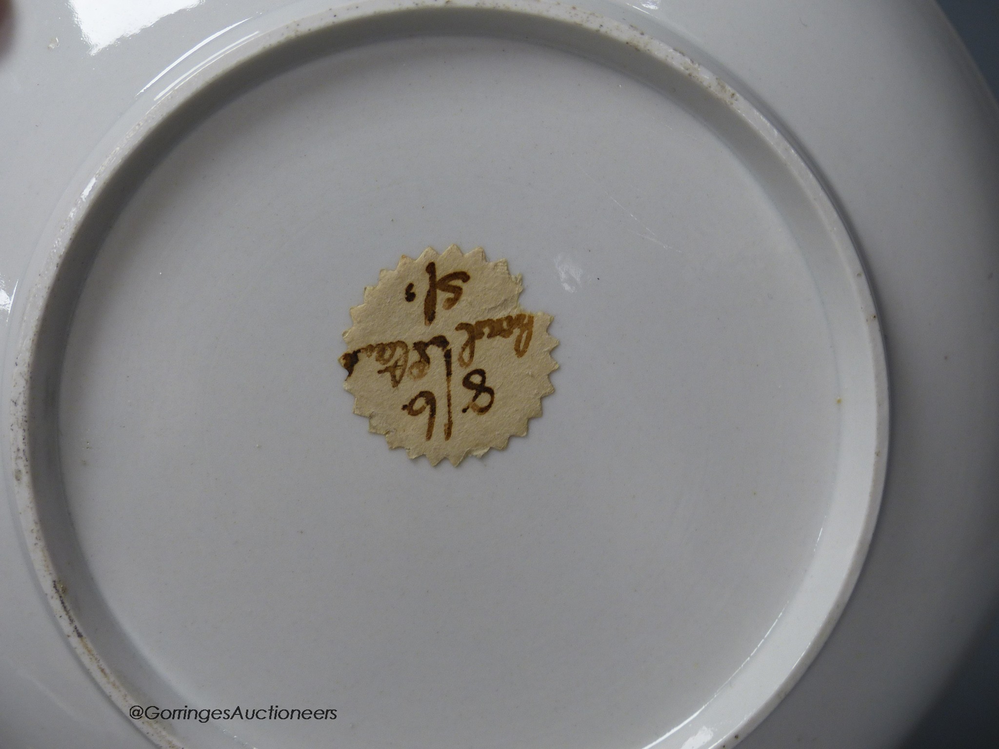 A Barr Worcester yellow ground saucer dish printed with 'Country Folk' and a New Hall Saucer dish painted with pattern No 85, largest 19cm diameter